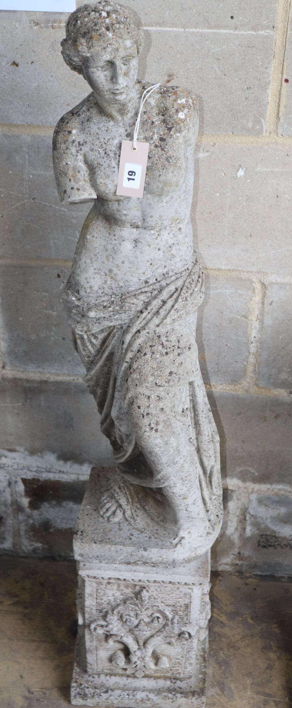 A reconstituted stone garden ornament, Venus, H.116cm